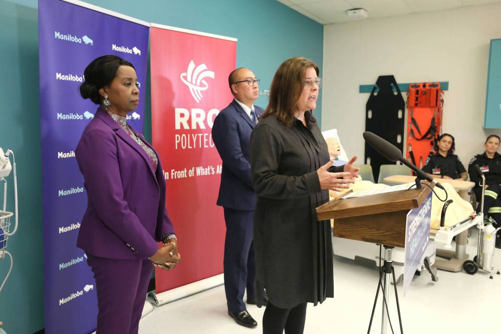 Health Minister Audrey Gordon (from left), Skills and Immigration Minister Jon Reyes and Premier Heather Stefanson announce a new $12.5-million simulation training centre for health-care professionals at Red River College Polytechnic to open in 2024. (Ruth Bonneville / Winnipeg Free Press)