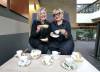 RUTH BONNEVILLE / WINNIPEG FREE PRESS
                                Volunteers Karen Bryk (left) and Carole Vivier have collected donated tea cups from women all over the province for the Guardian Angel Benefit for Women’s Cancer, billed as Manitoba’s largest tea party.