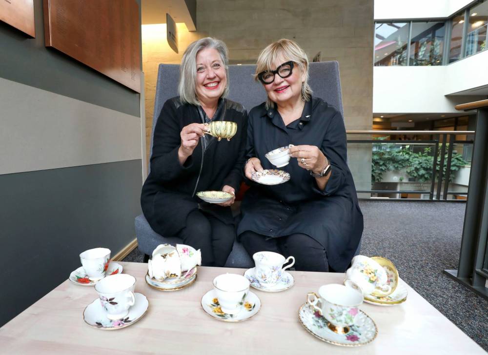 RUTH BONNEVILLE / WINNIPEG FREE PRESS
Volunteers Karen Bryk (left) and Carole Vivier have collected donated tea cups from women all over the province for the Guardian Angel Benefit for Women’s Cancer, billed as Manitoba’s largest tea party.