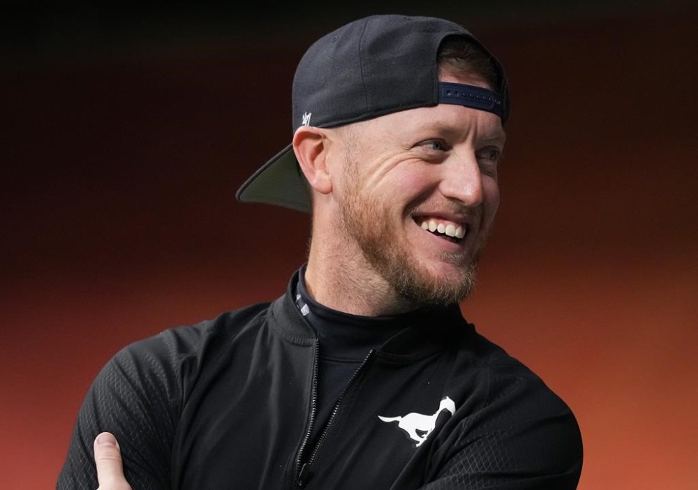 Calgary Stampeders quarterback Bo Levi Mitchell laughs before the CFL western semi-final football game against the B.C. Lions, in Vancouver, B.C., Sunday, Nov. 6, 2022. The Hamilton Tiger-Cats will have first crack at giving quarterback Bo Levi Mitchell a new CFL home. THE CANADIAN PRESS/Darryl Dyck