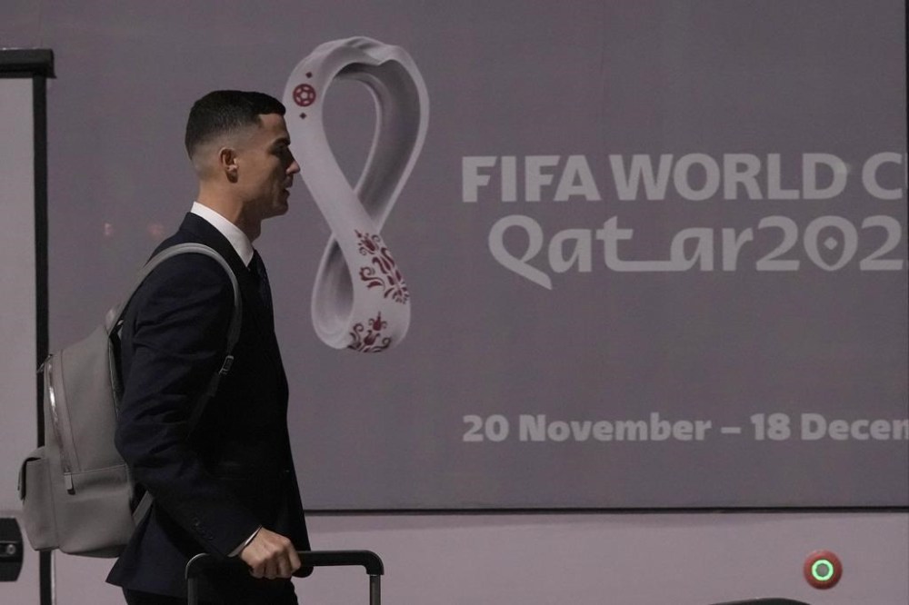 Cristiano Ronaldo of Portugal's national soccer team arrives at Hamad International airport in Doha, Qatar, Friday, Nov. 18, 2022 ahead of the upcoming World Cup. Portugal will play the first match in the World Cup against Ghana on Nov. 23. (AP Photo/Hassan Ammar)