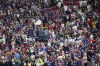 Fans from the United States cheer for their team during the World Cup group B soccer match between England and The United States, at the Al Bayt Stadium in Al Khor, Qatar, Friday, Nov. 25, 2022. (AP Photo/Ebrahim Noroozi)