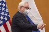 FILE - Russian Deputy Foreign Minister Sergei Ryabkov arrives for security talks with US Deputy Secretary of State Wendy Sherman at the United States Mission in Geneva, Switzerland, Jan. 10, 2022. A senior Russian diplomat says that Russia and the United States have repeatedly come close to reaching agreement on a prisoner exchange and a deal remains possible before the year's end. The Biden administration long has been trying to negotiate the release of WNBA star Brittney Griner and another American jailed in Russia, corporate security executive Paul Whelan, including through a possible prisoner swap with Moscow. (Denis Balibouse/Pool via AP, File)