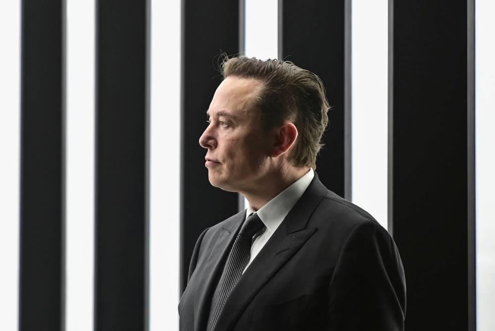 Patrick Pleul / The Associated Press files
Elon Musk’s US$44 million Twitter gamble is likely to become a distraction that harms his other enterprises.