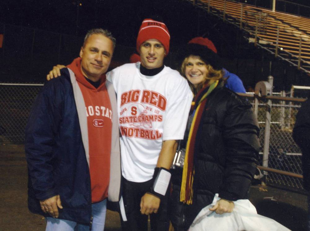 Zach with his parents Dean and Shelly. (Supplied)