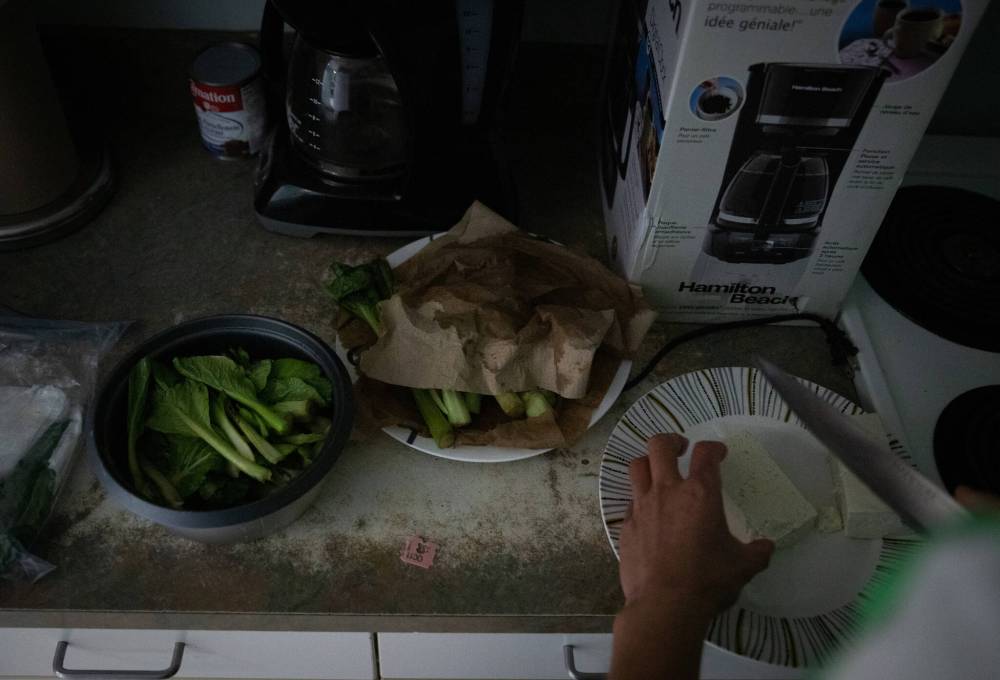 JESSICA LEE / WINNIPEG FREE PRESS
Mah brings all of his food from Winnipeg for the week and cooks it in the staff kitchen. Grocery prices are very high up north and there are no restaurants in the community.