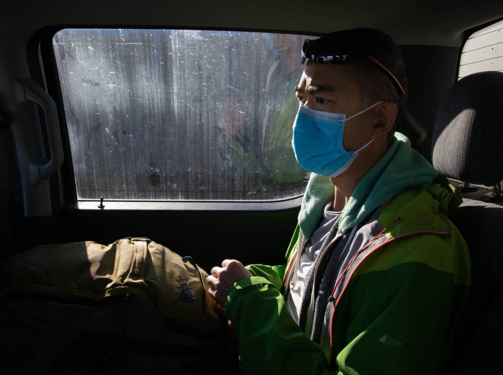 JESSICA LEE / WINNIPEG FREE PRESS
On Friday. after packing up his dental equipment and sanitizing the room, Mah rides to the Pukatawagan airport in the afternoon to catch the 5 pm flight to The Pas. There are no taxis in the community, so he finds his transportation by word of mouth.