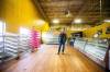 Ross Einfeld in the now empty KUB Bakery, which has closed its door. (Mikaela MacKenzie / Winnipeg Free Press)