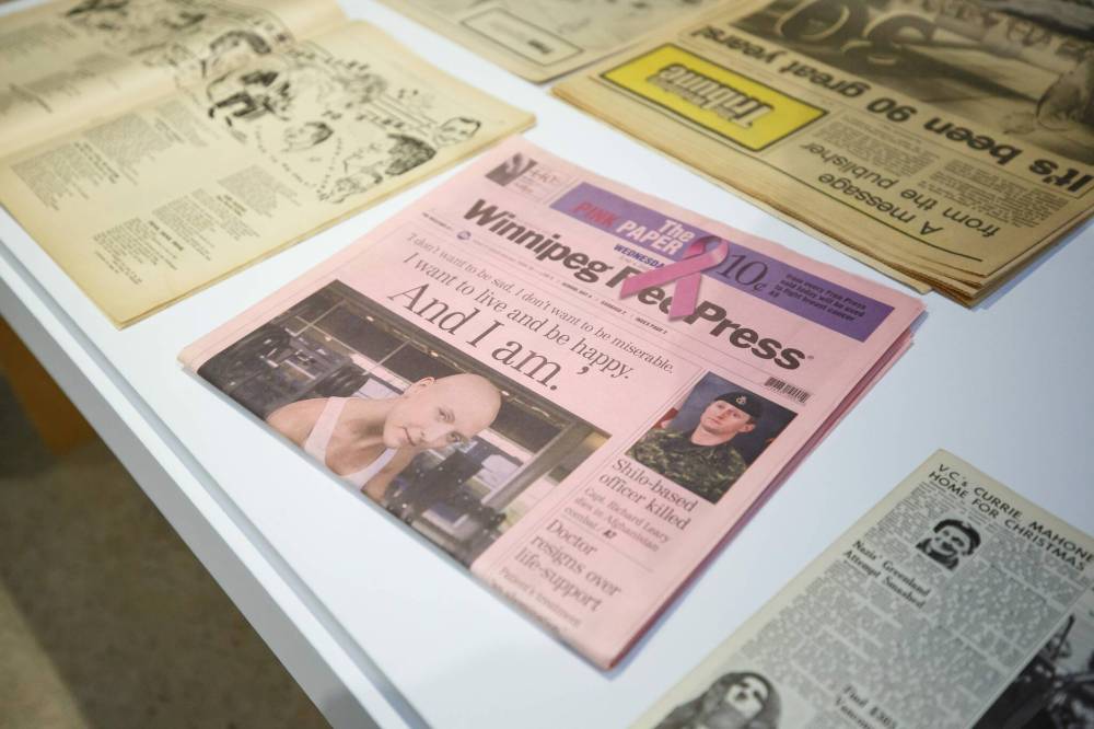 MIKE DEAL / WINNIPEG FREE PRESS
Some historical editions of the Winnipeg Free Press and Winnipeg Tribune.