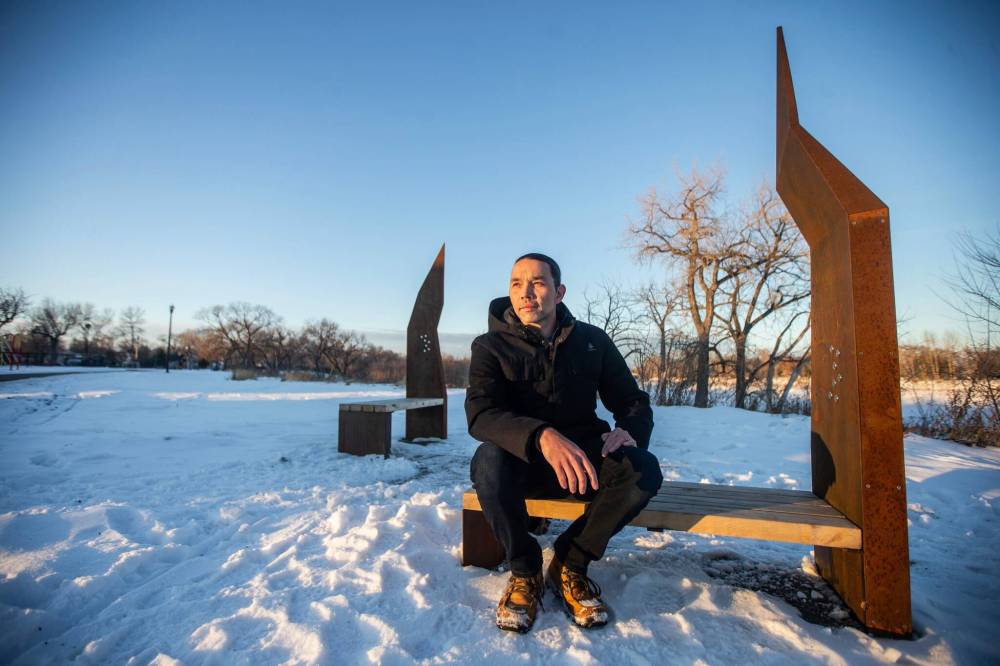 MIKAELA MACKENZIE / WINNIPEG FREE PRESS
Architect and artist Ryan Gorrie designed Bizindaadiwag, a bench with sound installation that is Winnipeg’s newest piece of public art.