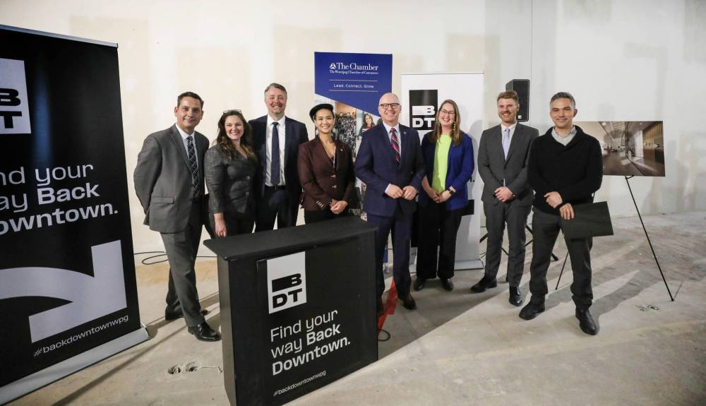 RUTH BONNEVILLE / WINNIPEG FREE PRESS
Members of the Find Their Way Back Downtown campaign: Loren Remillard (from left), president and CEO of Winnipeg Chamber of Commerce, Coun. Sherri Rollins, Chamber chairman Mark Jones, Coun. Vivian Santos, Mayor Scott Gillingham, Downtown Winnipeg BIZ CEO Kate Fenske, West End BIZ’s Joseph Kornelsen and Exchange District BIZ’s David Pensato.