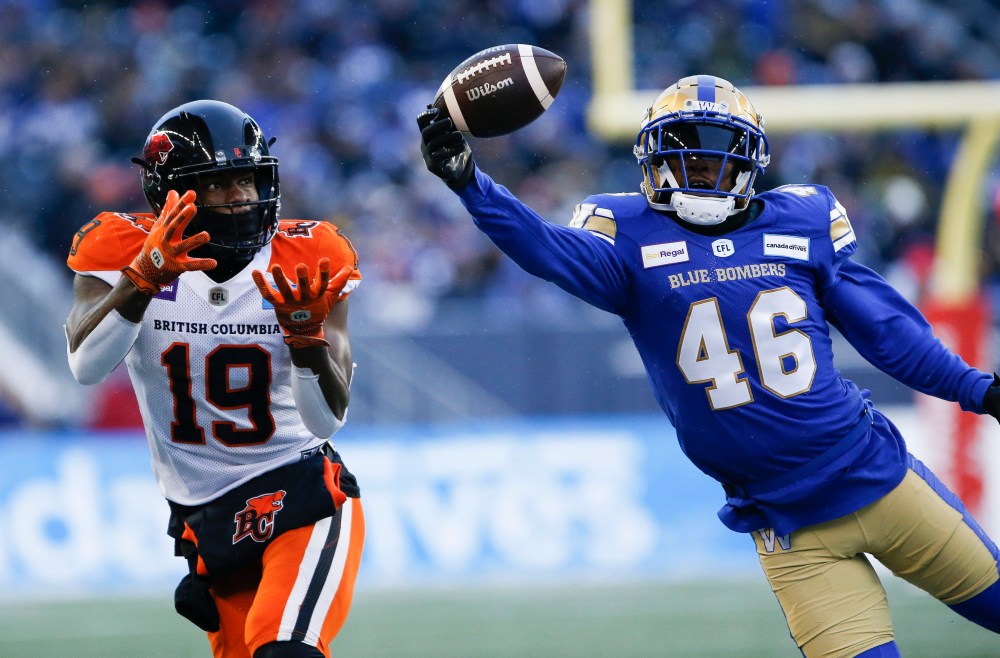 JOHN WOODS / THE CANADIAN PRESS
Winnipeg Blue Bombers' Desmond Lawrence knocks down a pass intended for BC Lions' Dominique Rhymes during the first half.