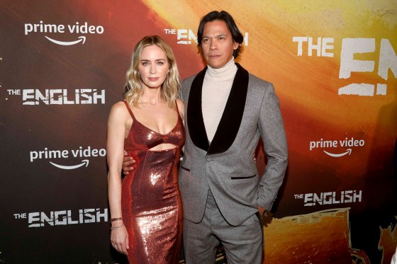 Actors Emily Blunt, left, and Chaske Spencer, right, attend the premiere of Prime Video's