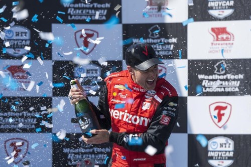 FILE - Team Penske driver Will Power, of Australia, celebrates after winning third place in the IndyCar season finale auto race at Laguna Seca Raceway on Sept. 11, 2022, Monterey, Calif. IndyCar has landed its own “Drive to Survive” type docudrama that will showcase the buildup to next year's Indianapolis 500. The six-part “100 Days to Indy” will air on The CW Network next spring and chronicle the 100-day window ahead of the “Greatest Spectacle in Racing” on May 28, 2023 at Indianapolis Motor Speedway. (AP Photo/Nic Coury, File)