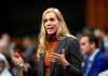 Minister of Sport Pascale St-Onge rises during Question Period in the House of Commons on Parliament Hill in Ottawa, Thursday, Dec. 8, 2022. The federal government is committing $2.4 million in crisis funding towards athletes' mental health. THE CANADIAN PRESS/Justin Tang