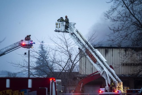 FILE - Firefighters work to control a blaze at an agricultural plant Thursday, Dec. 8, 2022, in Marengo, Iowa. State officials on Friday, Dec. 16, ordered the C6-Zero company to clean up and stabilize its east-central Iowa shingle recycling plant where an explosion and fire last week that injured around a dozen people and forced the evacuation of nearby homes. (Joseph Cress/Iowa City Press-Citizen via AP, File)