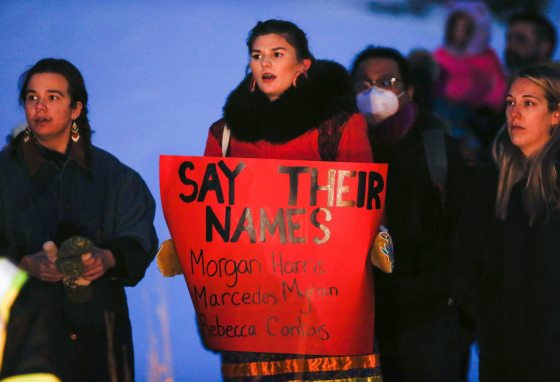 People gather at the Oodena Circle at The Forks for a vigil on Sunday.  (John Woods / Winnipeg Free Press)