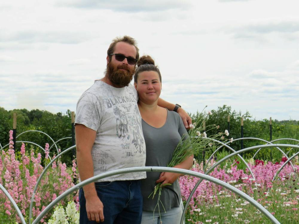 Colleen Zacharias / Winnipeg Free Press
                                Manitoba&rsquo;s newest flower farm, H&H Floral Fields, is owned and operated by Joel, left, and 
Kendall Penner.