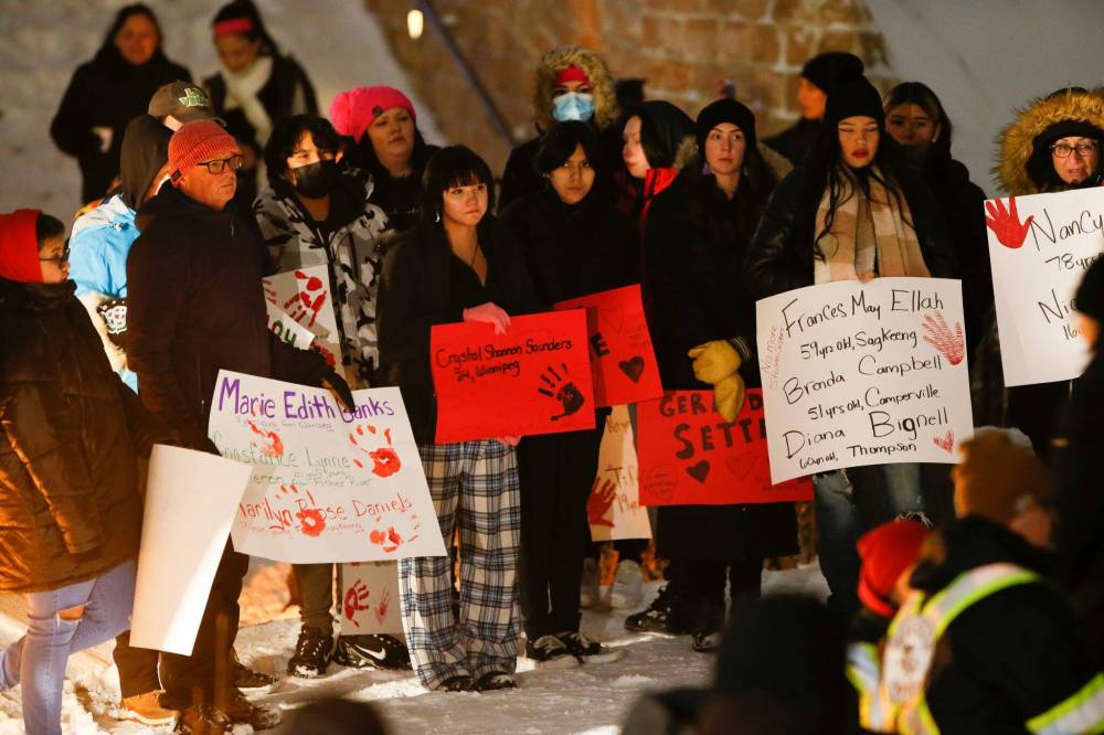JOHN WOODS / WINNIPEG FREE PRESS
People gathered at the Oodena Circle at the forks for a vigil to name and remember MMIWG on Sunday.