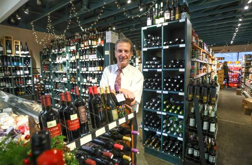 Photos by RUTH BONNEVILLE / WINNIPEG FREE PRESS
                                George Andrews of G.J. Andrews, in his specialty food store. ‘We started filling the store with what customers want, and it has worked out beautifully.’
