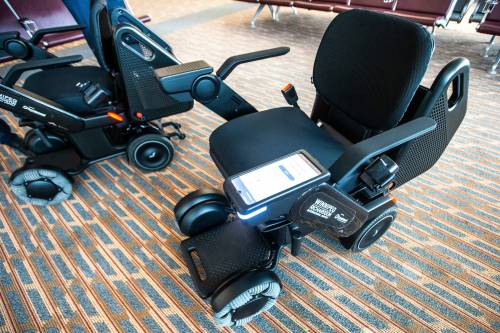 MIKAELA MACKENZIE / WINNIPEG FREE PRESS The new self-driving wheelchairs, developed by Winnipeg mobility equipment company Scootaround and Japanese firm WHILL Inc., are the first of their kind to be used in a North America airport.