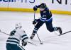 FRED GREENSLADE / THE CANADIAN PRESS FILES                                Jets head coach says lining up with Adam Lowry and Mason Appleton will give Nikolaj Ehlers (above) more room to wheel and deal Tuesday night against the San Jose Sharks.