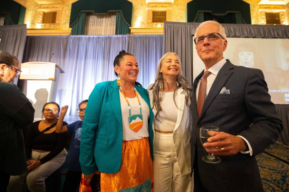 MIKAELA MACKENZIE / WINNIPEG FREE PRESS Calahoo Stonehouse (left, Albertan MLA), Nahanni Fontaine (NDP candidate), and Nello Altomare (NDP candidate) greet each other minutes after polls close at the NDP party headquarters at the Fort Garry Hotel on Tuesday, Oct. 3, 2023. For election story. Winnipeg Free Press 2023.