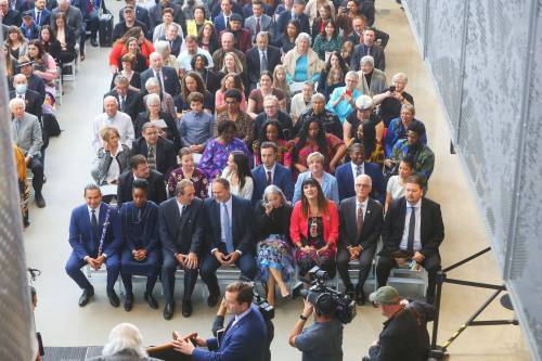 Premier-designate Wab Kinew and members of his cabinet (front two rows) at the swearing-in ceremony. (Mike Deal / Winnipeg Free Press)