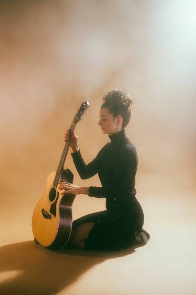 Laina Brown photo
                                Singer-songwriter Larysa Musick&rsquo;s first stage appearances were as a slam poet.