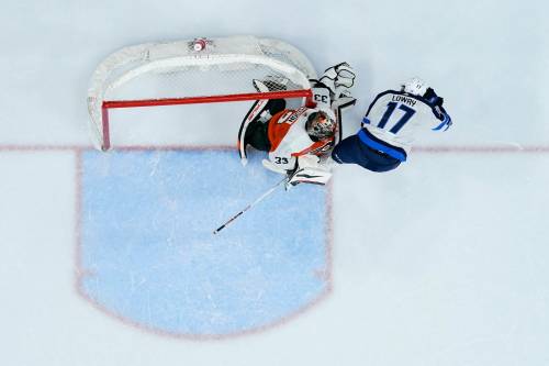 Matt Slocum / The Associated Press
                                Jets captain Adam Lowry came up empty-handed Thursday when he had a shorthanded breakaway against the Philadelphia Flyers.