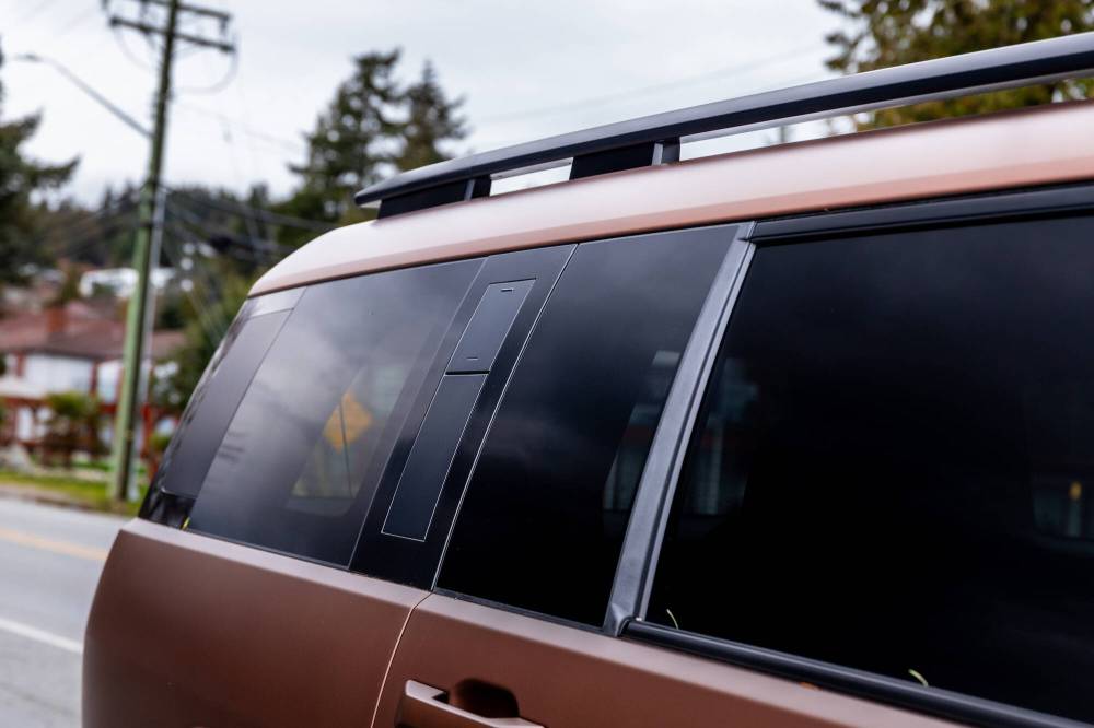 Supplied
A grab handle, behind a lockable folding panel, offers easy access to the roof racks.