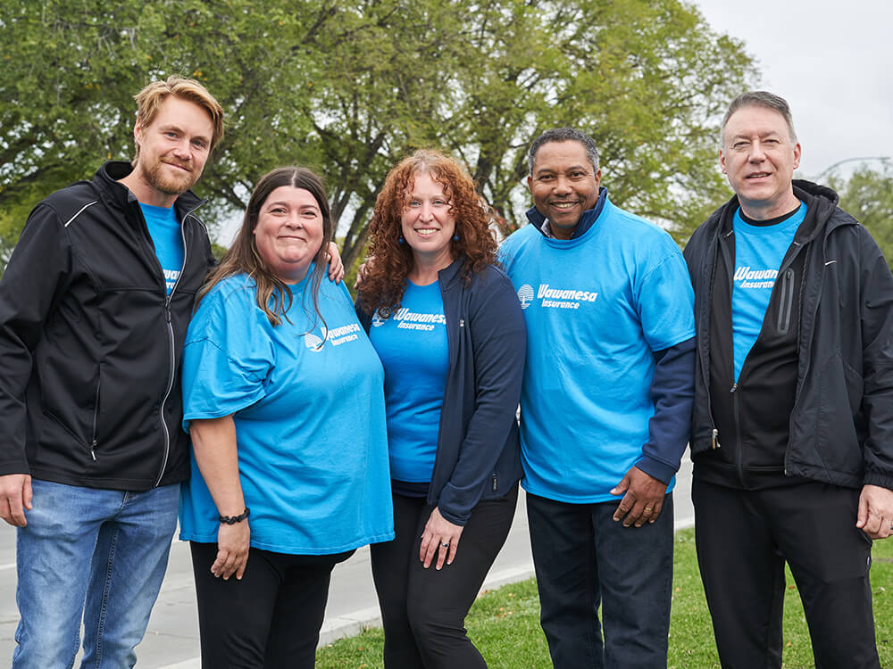 Wawanesa Mutual Insurance employees volunteering together at a company event.
