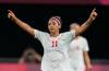 Canada’s Desiree Scott celebrates at the end of a women’s soccer match against Chile at the 2020 Summer Olympics, held in 2021, in Sapporo, Japan. (Silvia Izquierdo / The Associated Press files)