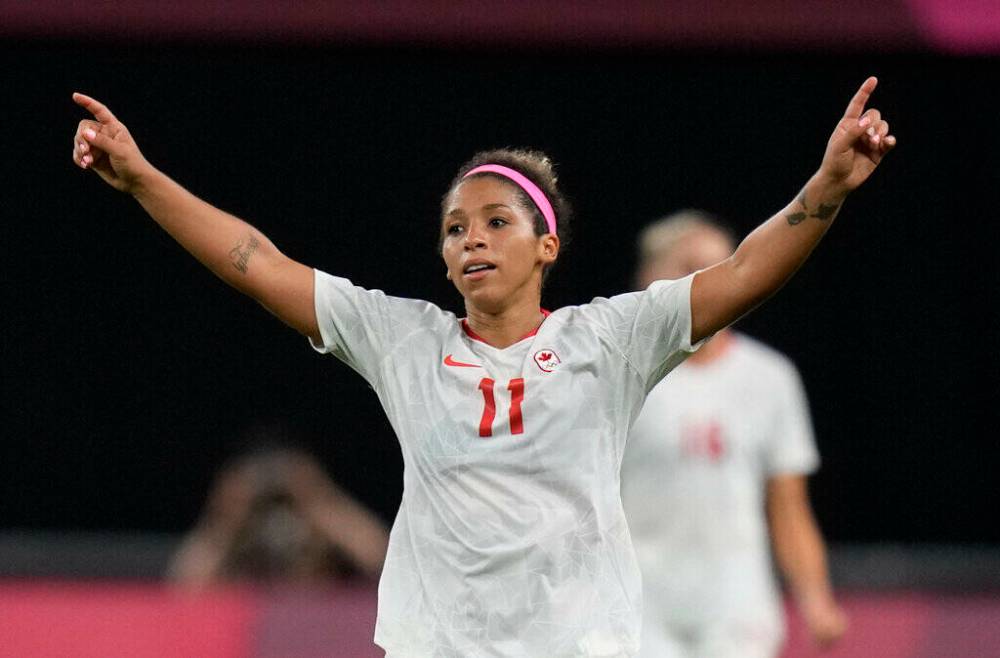 Canada’s Desiree Scott celebrates at the end of a women’s soccer match against Chile at the 2020 Summer Olympics, held in 2021, in Sapporo, Japan. (Silvia Izquierdo / The Associated Press files)