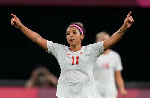 Canada’s Desiree Scott celebrates at the end of a women’s soccer match against Chile at the 2020 Summer Olympics, held in 2021, in Sapporo, Japan. (Silvia Izquierdo / The Associated Press files)