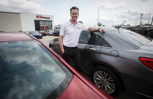 JOHN WOODS / FREE PRESS
                                Andrew MacIver, co-owner of Ride Time, an independent used car dealership in Winnipeg, says sector dealerships are facing unique postCOVID-9 pandemic struggles, including a lack of affordable inventory and increased competition in the auction market.