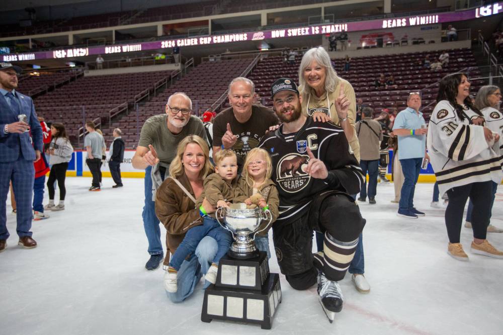 Tori Hartman/Hershey Bears
Dylan McIlrath celebrates the recent win with his family.