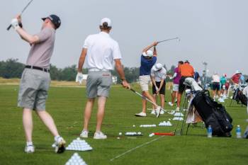 MIKE DEAL / FREE PRESS
                                Golfers practise on the driving range at Southwood Golf and Country Club ahead of this week’s Manitoba Open.