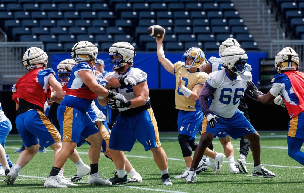 MIKE DEAL / FREE PRESS
Winnipeg Blue Bombers’ quarterback, Zach Collaros (8), during practice at Princess Auto Stadium Monday. 240617 - Monday, June 17, 2024.