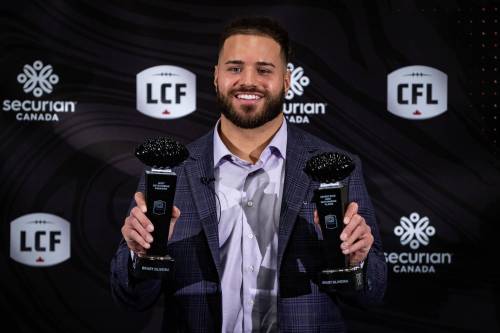 THE CANADIAN PRESS/Ethan Cairns
                                Winnipeg Blue Bombers’ Brady Oliveira is awarded Most Outstanding Player and Most Outstanding Canadian during the CFL Awards in Vancouver, on Thursday.