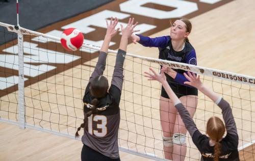 BROOK JONES / FREE PRESS
                                Vincent Massey Vikings setter Payton Oakden spikes the ball Wednesday against the Steinbach Sabres in provincial high school girls semifinal action.