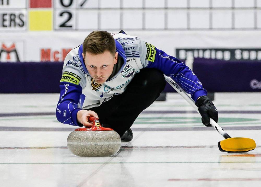 JOHN WOODS / FREE PRESS Braden Calvert throws as his team face Reid Carruthers in the Manitoba curling championship game in Portage La Prairie Sunday, February 9, 2025. Reporter: josh