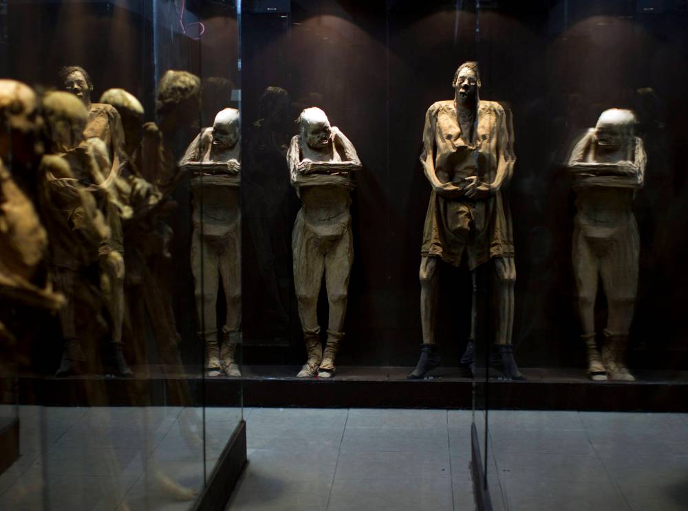 Dario Lopez-Mills / The Associated Press Files
Mummified bodies are displayed inside glass enclosures at the Mummy Museum in the colonial city of Guanajuato, Mexico.