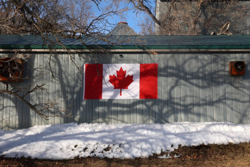 TIM SMITH / THE BRANDON SUN FILES A Canadian flag is see affixed to the side of a barn along Grand Valley Road west of Brandon on Thursday. In the wake of U.S. tariffs against Canada and comments by President Donald Trump about Canada becoming the 51st state, Canadian flags and other displays of patriotism have been much more visible in Brandon and across the country. (Tim Smith/The Brandon Sun)