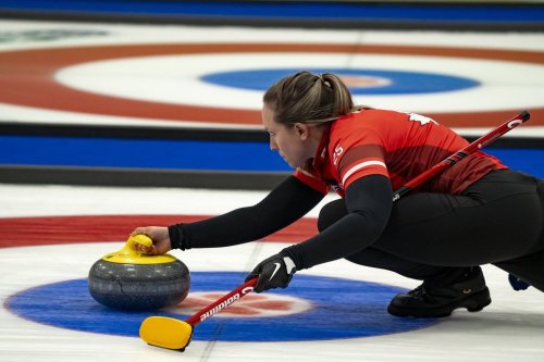 Team Canada skip Rachel Homan delivers a rock against Manitoba in her teams quarter final victory during the Scotties Tournament of Hearts action in Thunder Bay, Ont., Saturday, Feb. 22, 2025. THE CANADIAN PRESS/David Jackson
