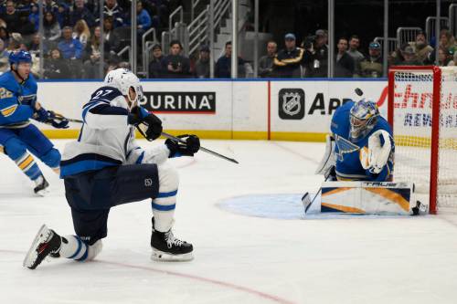 Jeff Le / THE ASSOCIATED PRESS FILES
                                Winnipeg Jets winger Nikolaj Ehlers (left) scores a goal against St. Louis Blues goaltender Joel Hofer the last time the two Central Division teams clashed in February.