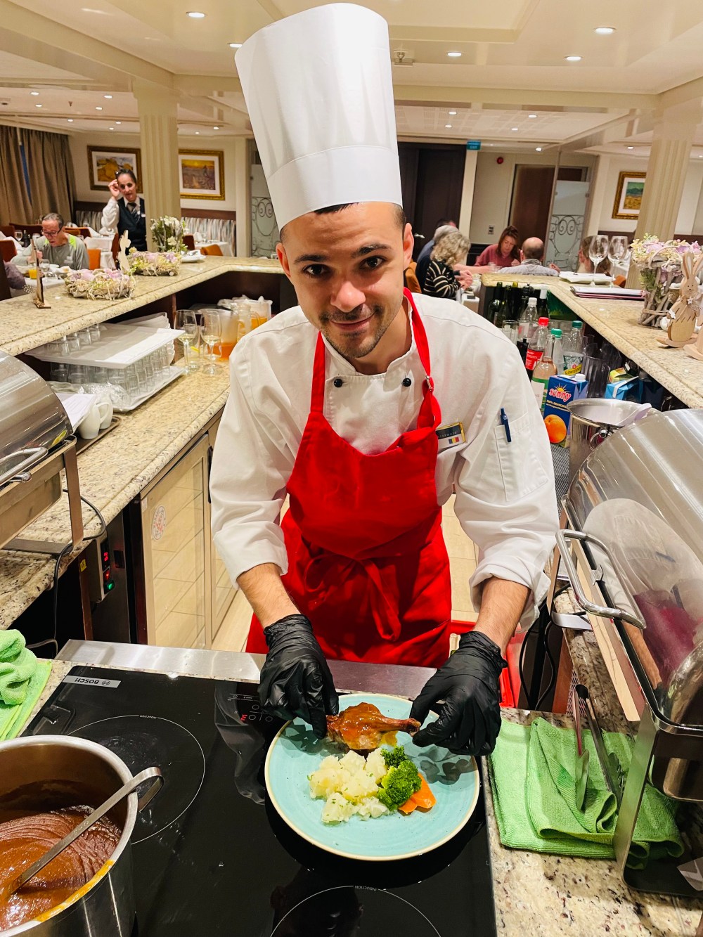 Steve MacNaull / Free Press
Chef Florin plates duck confit aboard the AmaCello.