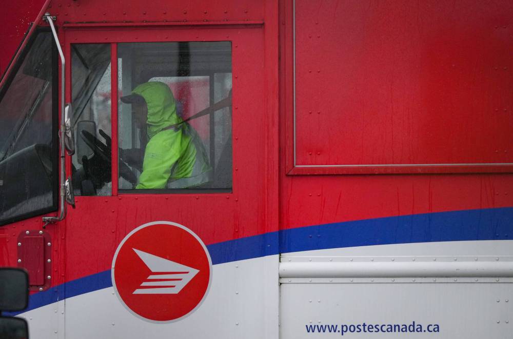 Darryl Dyck / The Canadian Press files
A review recommends Canada Post stop daily delivery to private homes.