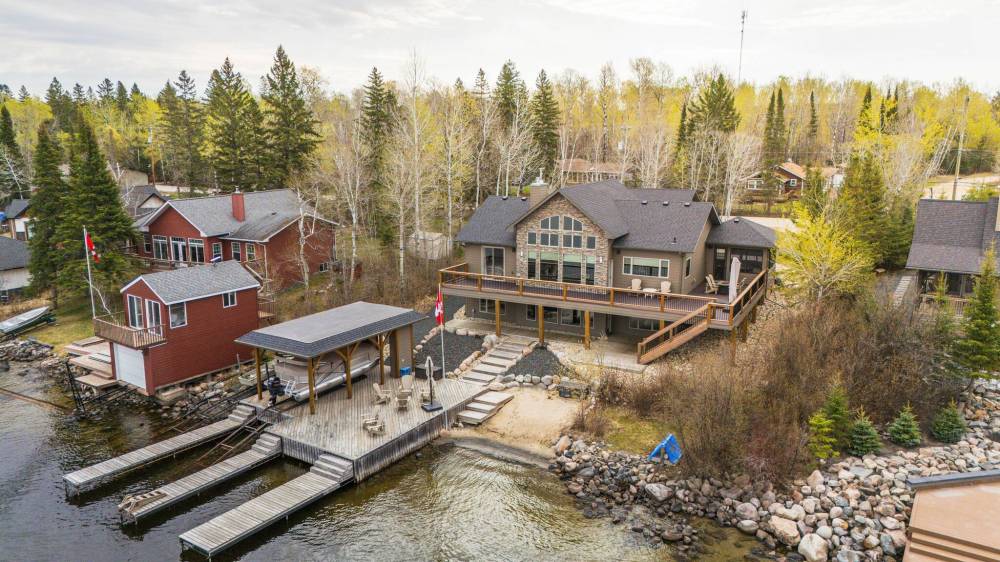 SUPPLIED
Essentially two cottages in one, this Maric-built masterpiece in Falcon Lake comes with six bedrooms, four-and-a-half baths, fabulous finishes and enchanting lake views.