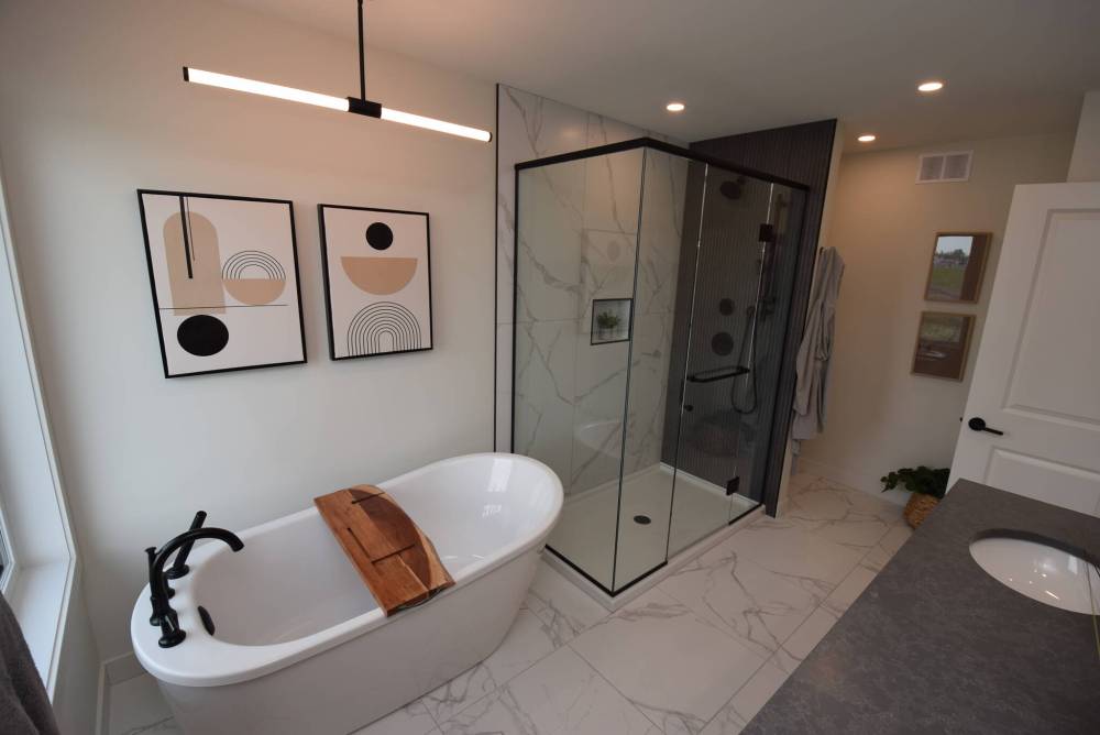 Todd Lewys photos / Free Press
Spa-like comforts await in the ensuite, with its deep soaker tub, walk-in shower and heated tile floor.